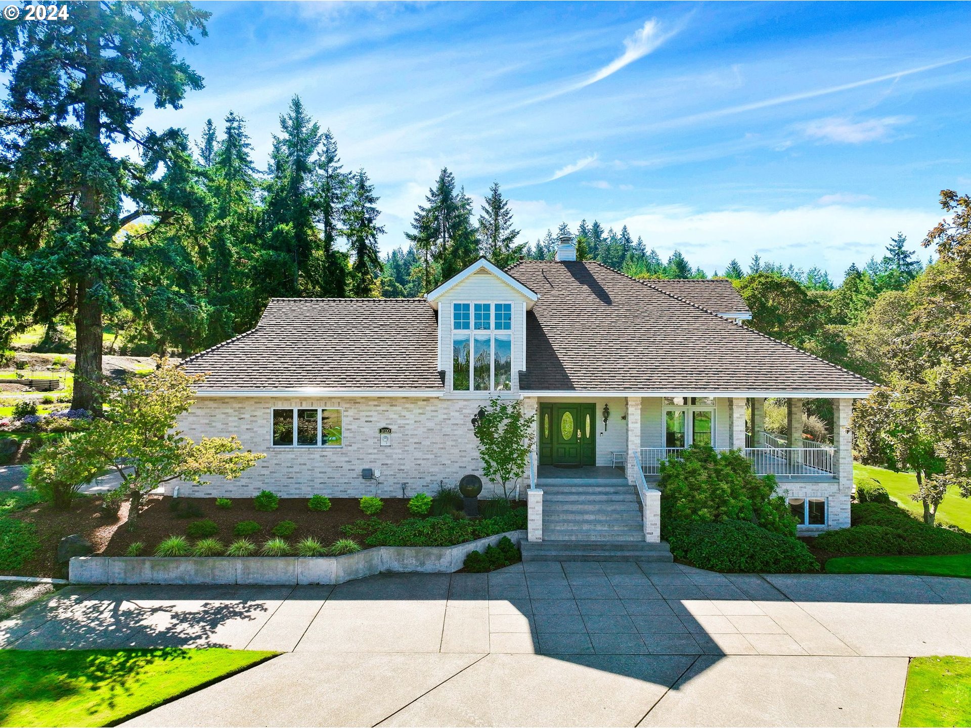 front view of a house with a yard