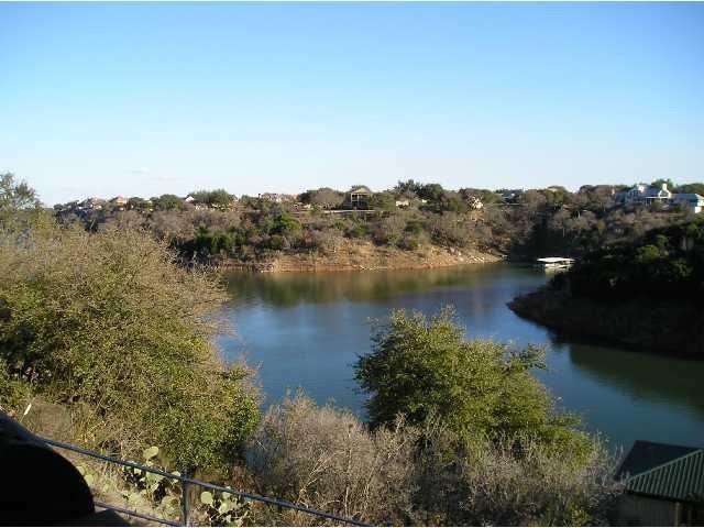 an aerial view of valley and lake