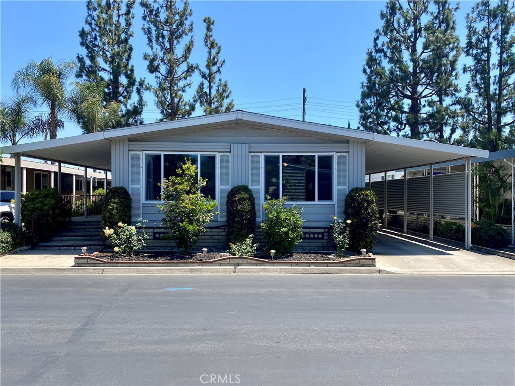 front view of a house with a small yard