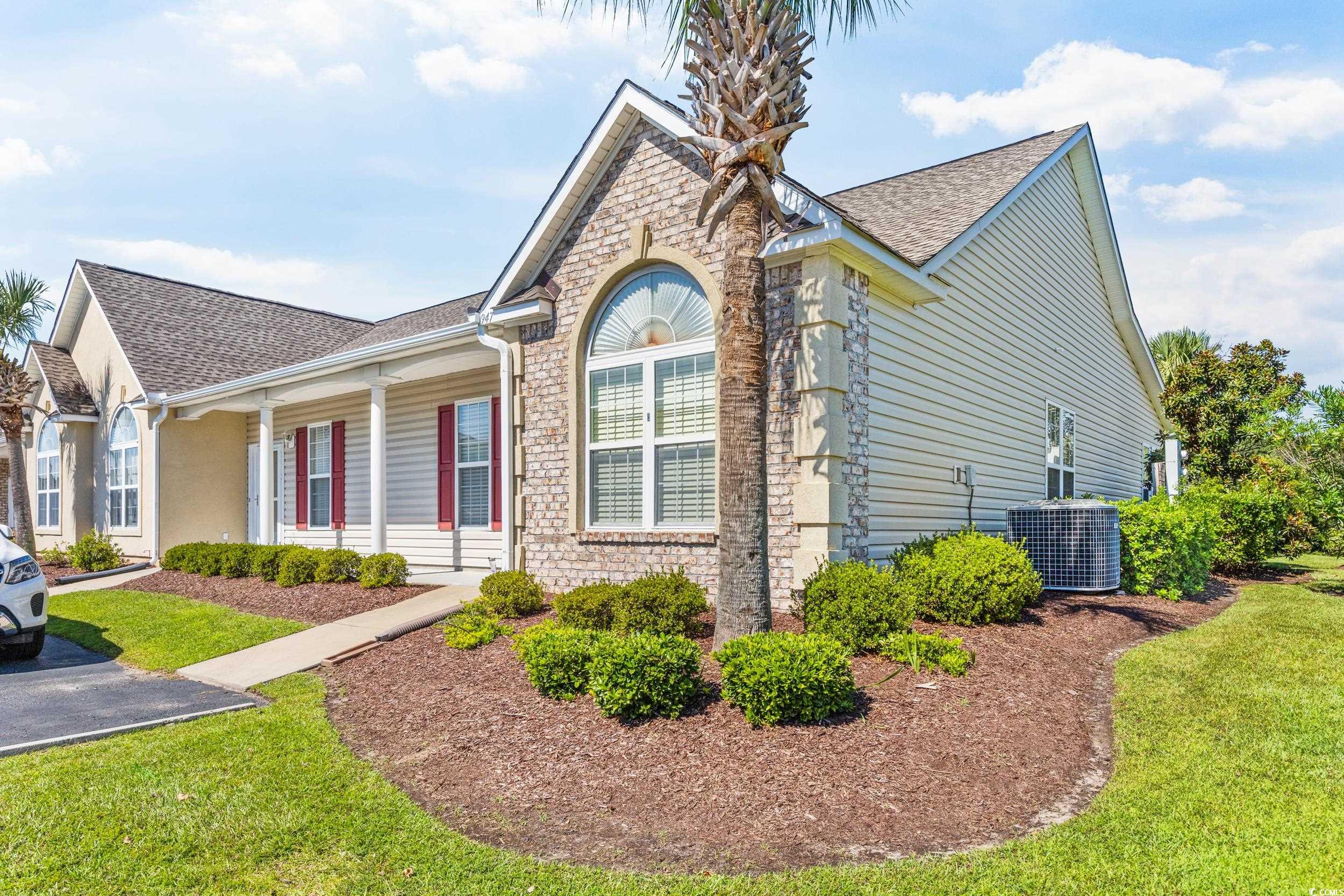 View of front of property with cooling unit and a