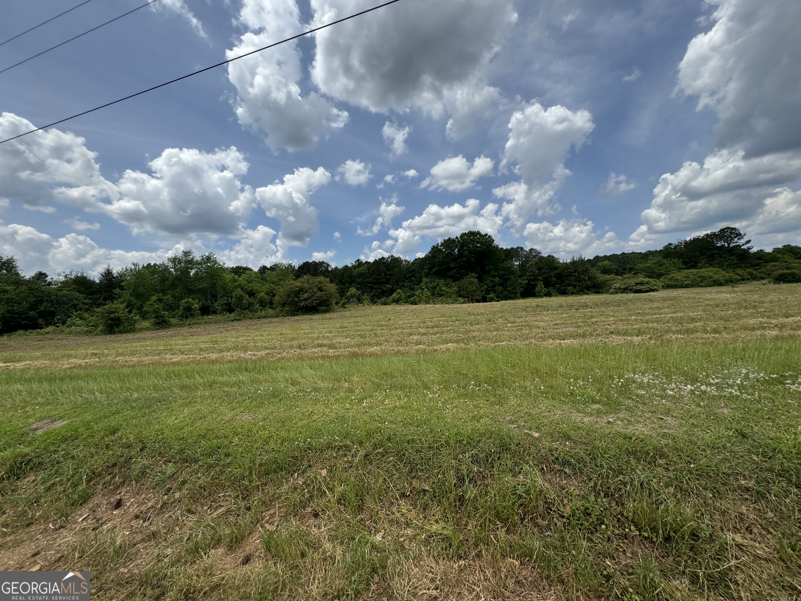 a view of a lake with a big yard