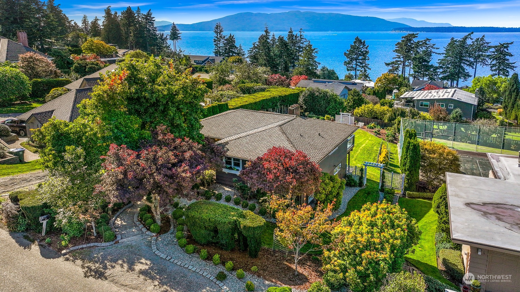 an aerial view of a house with a garden