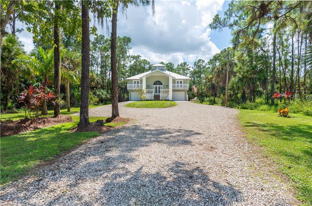 Single story home featuring a front yard