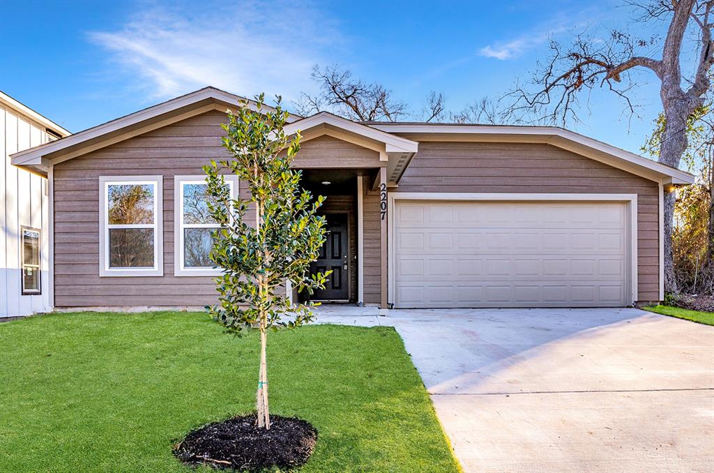 a house view with a garden space