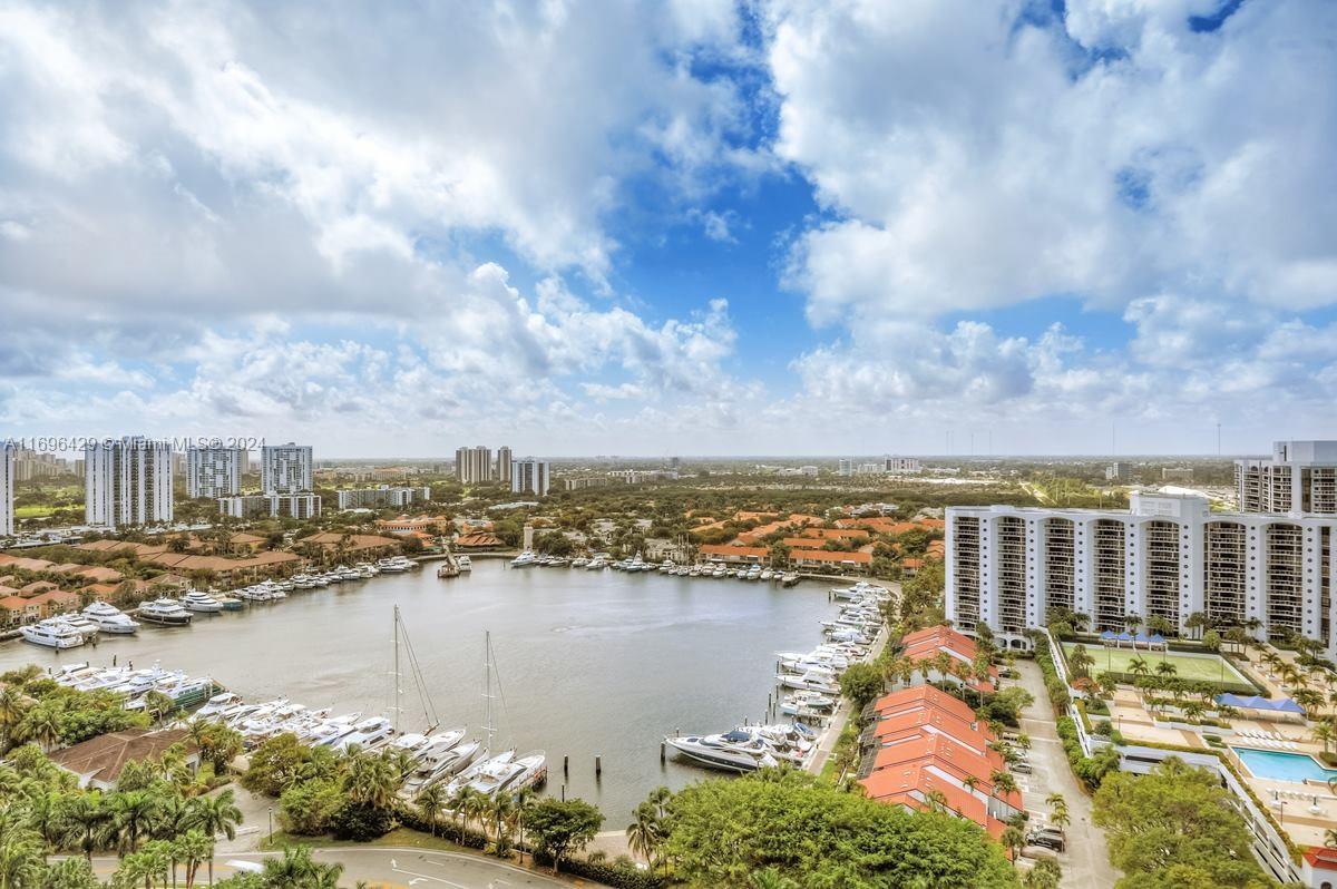 a view of a lake with city