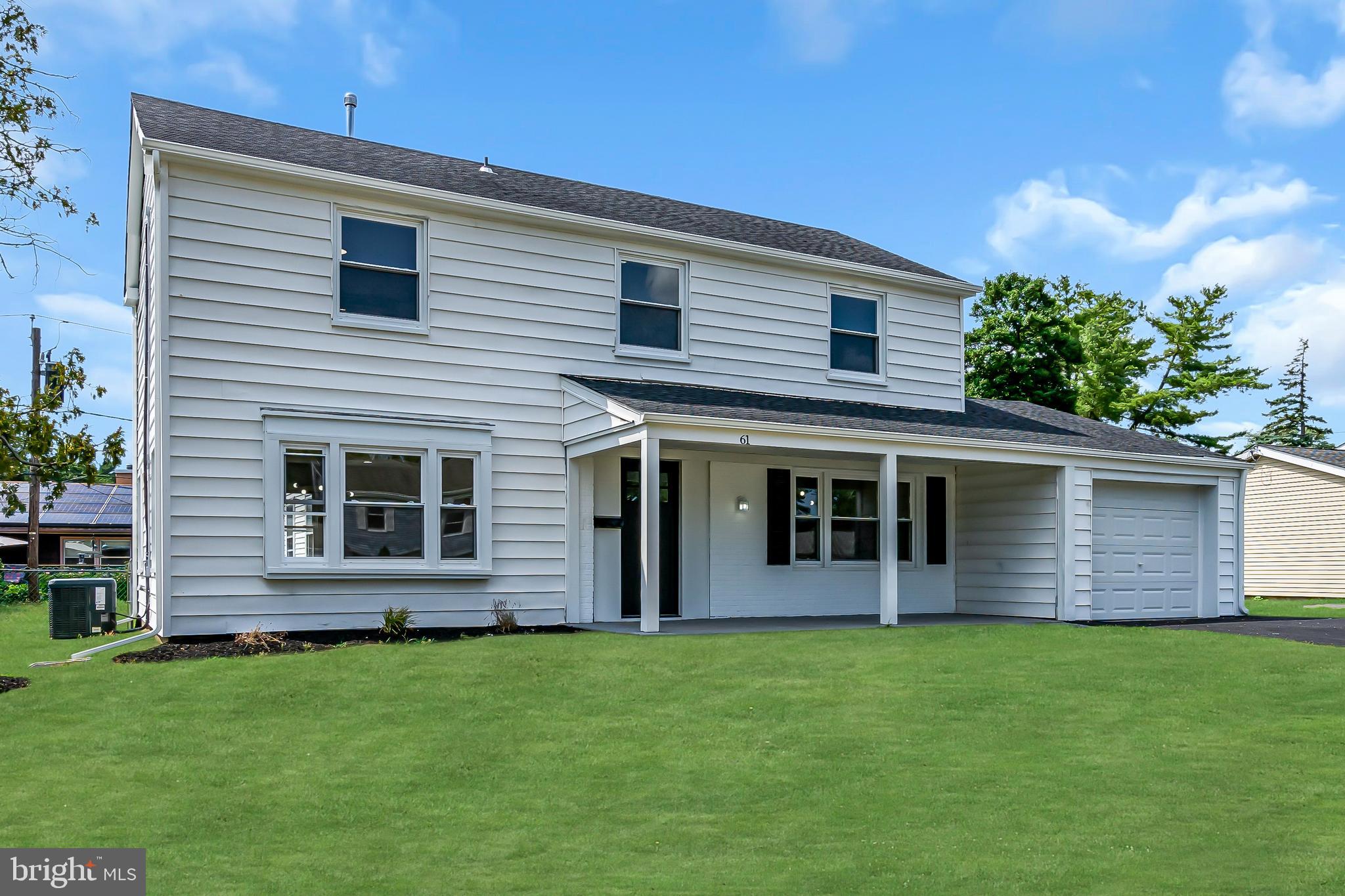 a view of a house with a garden