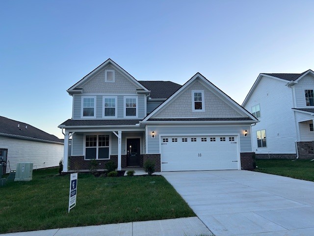 a view of house with yard in front of it