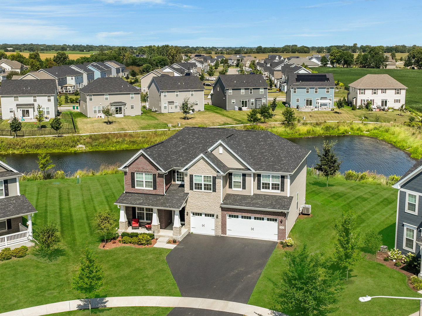 an aerial view of a house with a garden