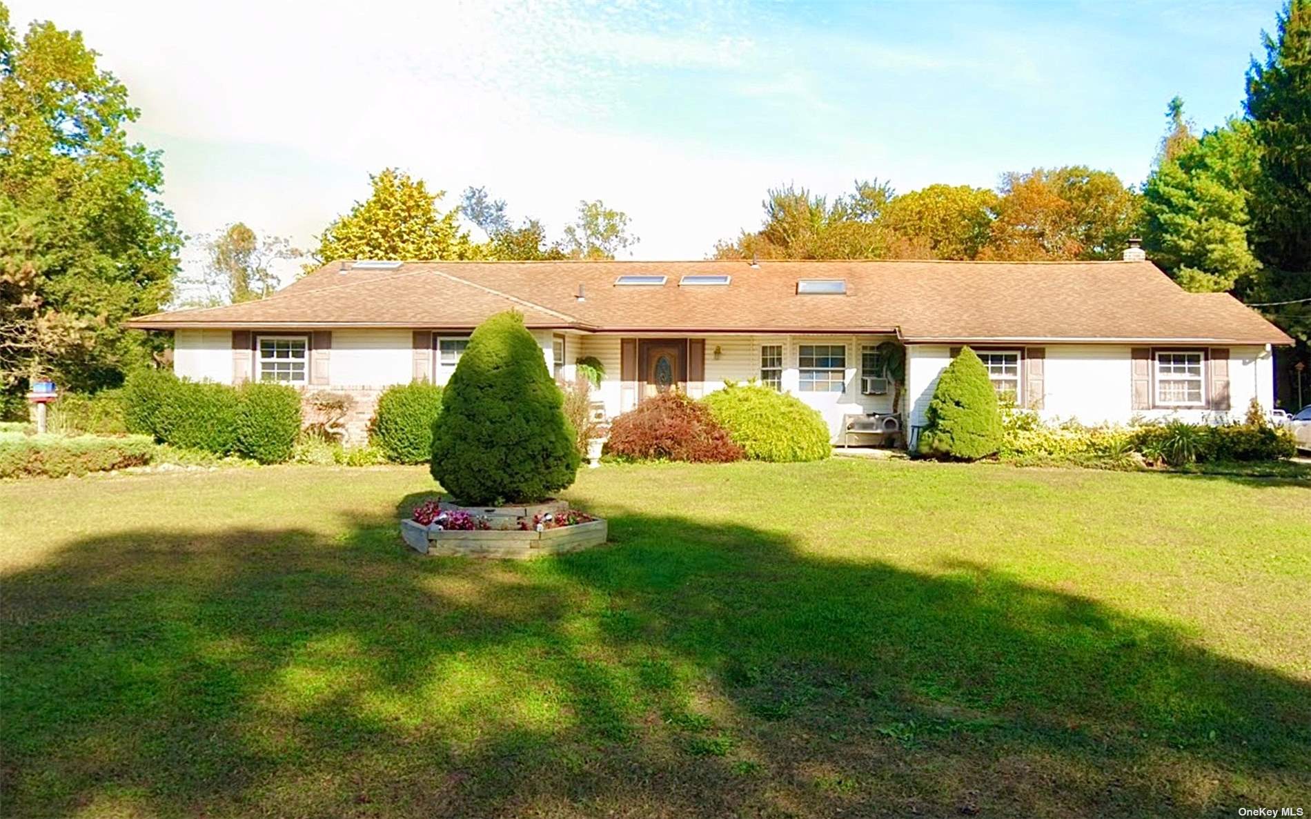 a view of a house with a garden