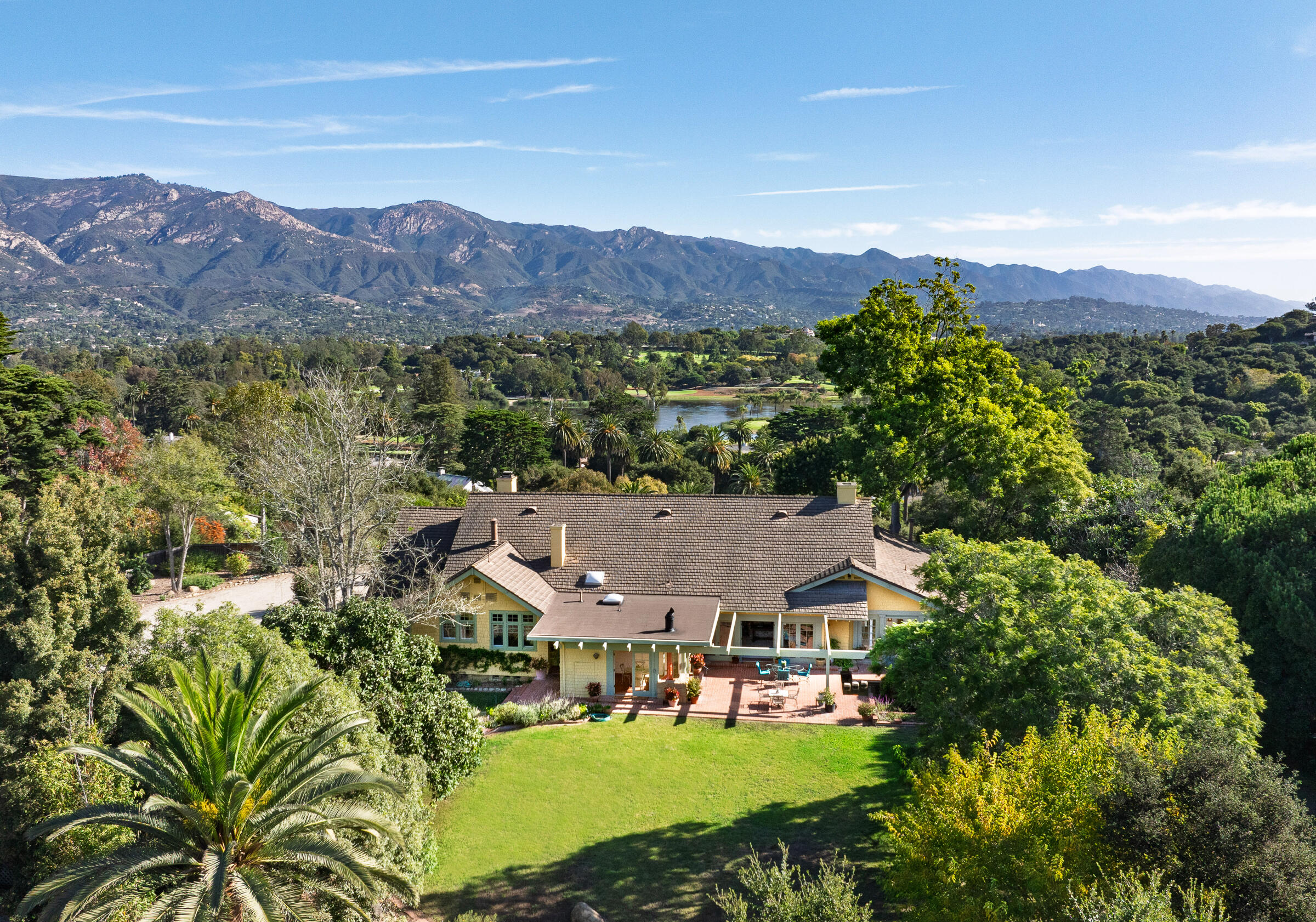 an aerial view of residential houses and outdoor space