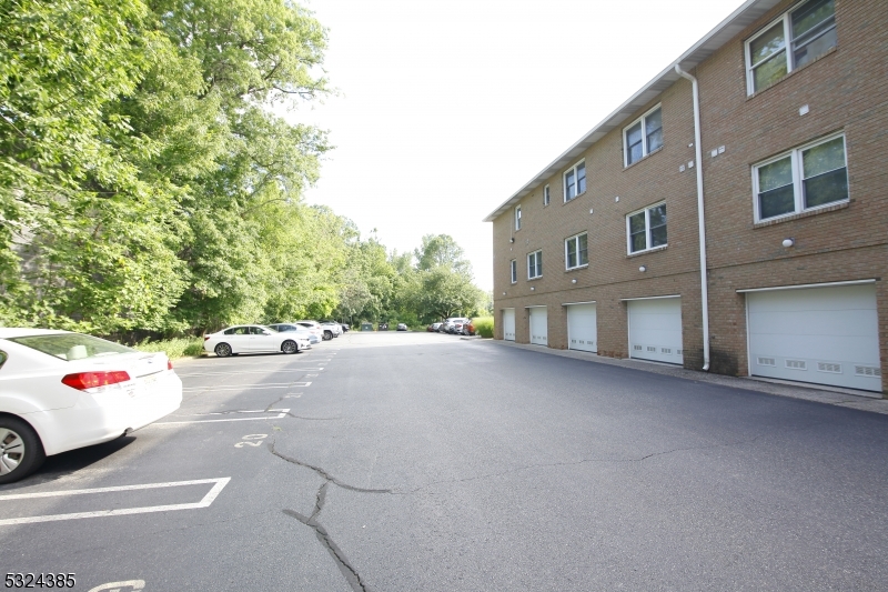 a view of a street with a parked cars