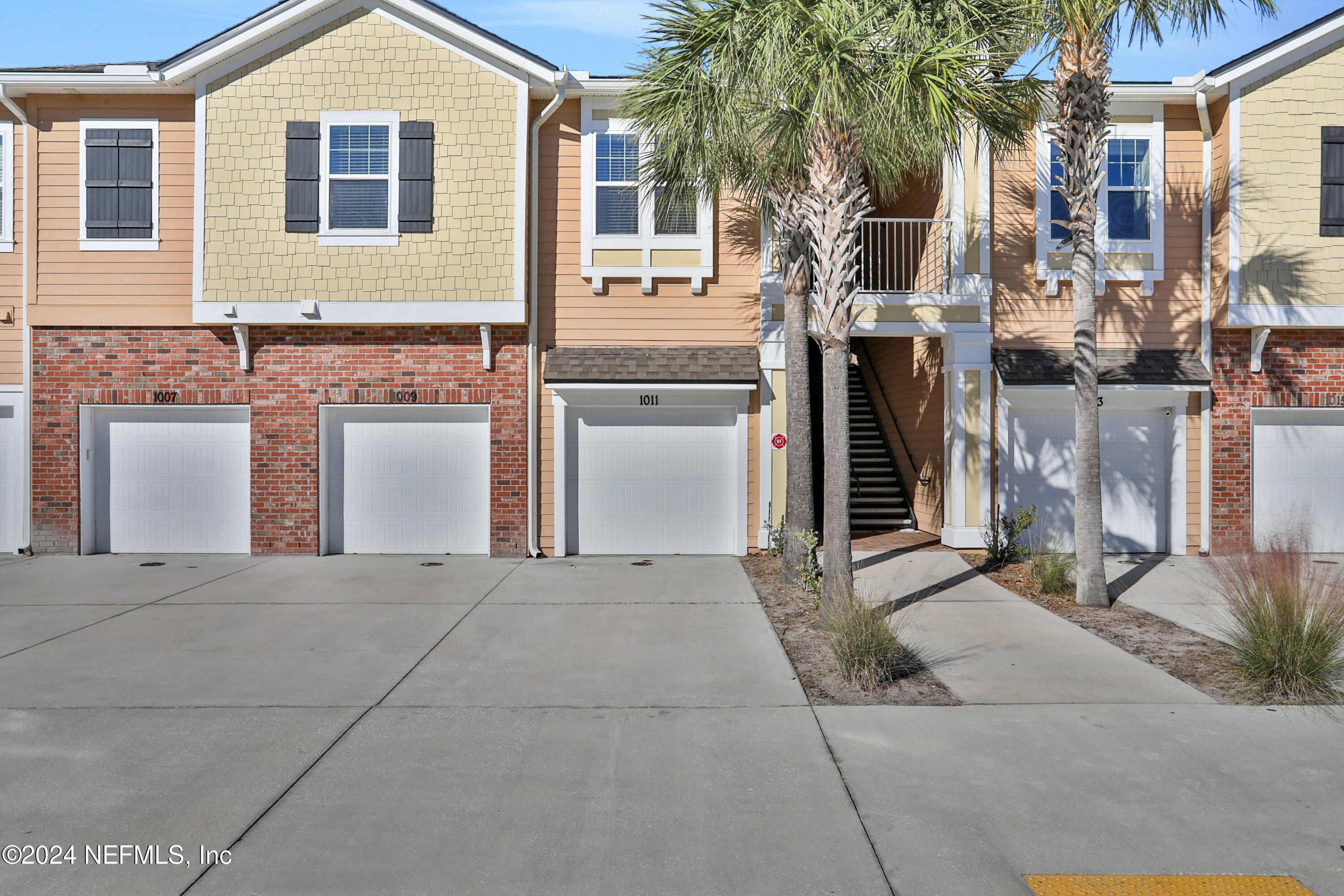 a front view of a house with yard