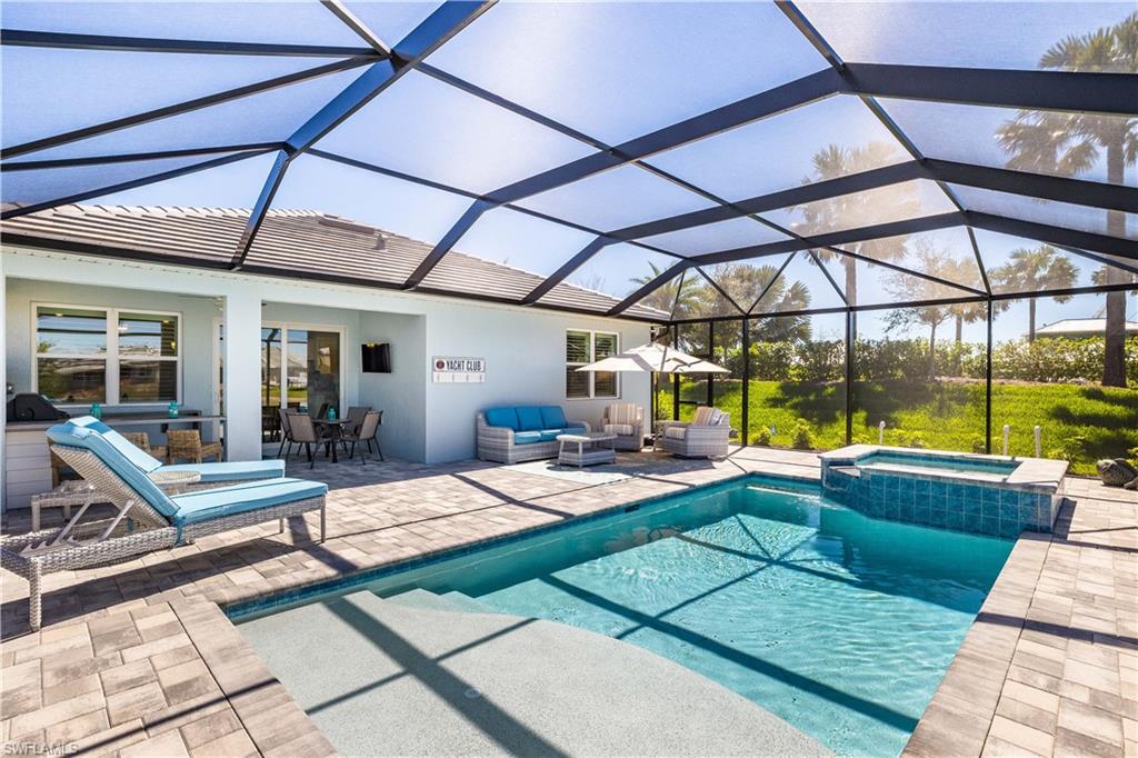 a view of a backyard with swimming pool