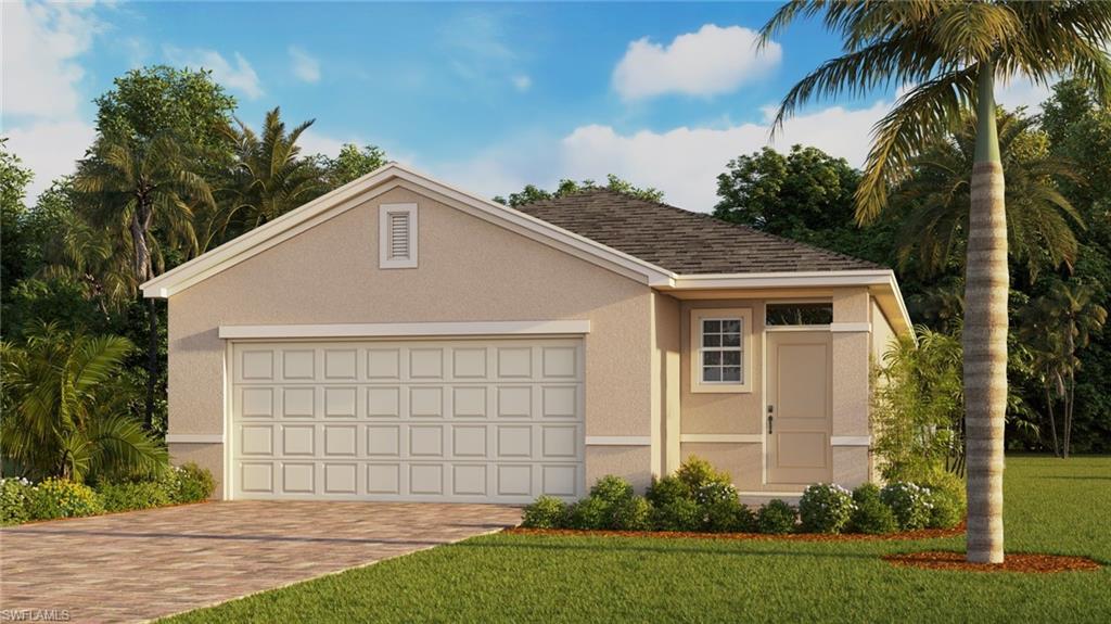 View of front of property with a front yard and a garage