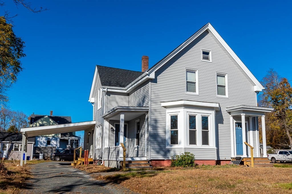 a front view of a house with street