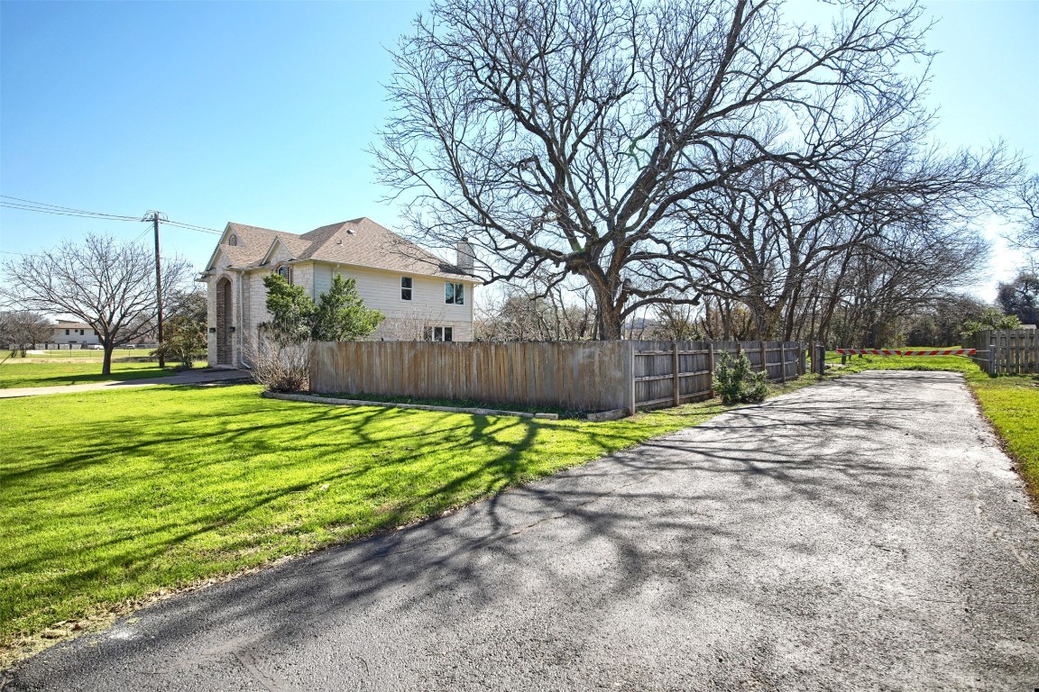 a view of a backyard with a garden