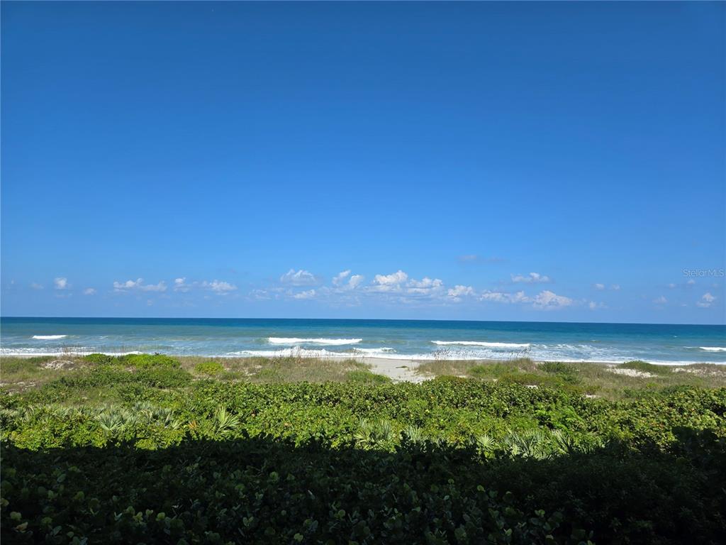 a view of an ocean from a room