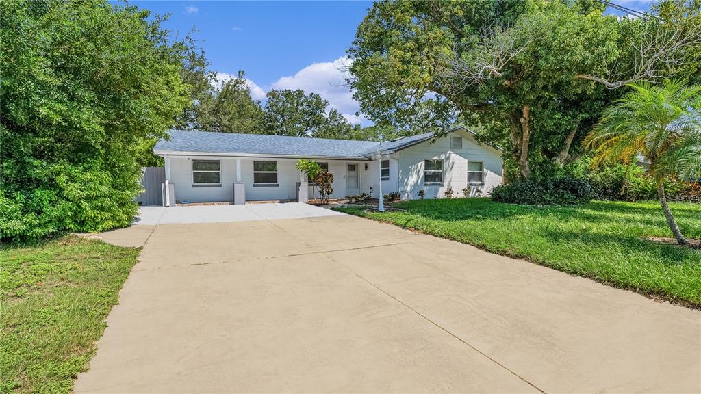 front view of a house with a yard