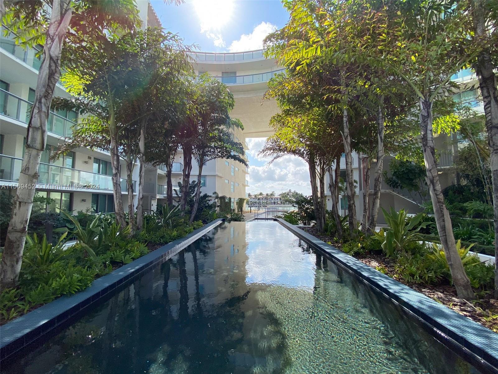 a view of swimming pool with a patio