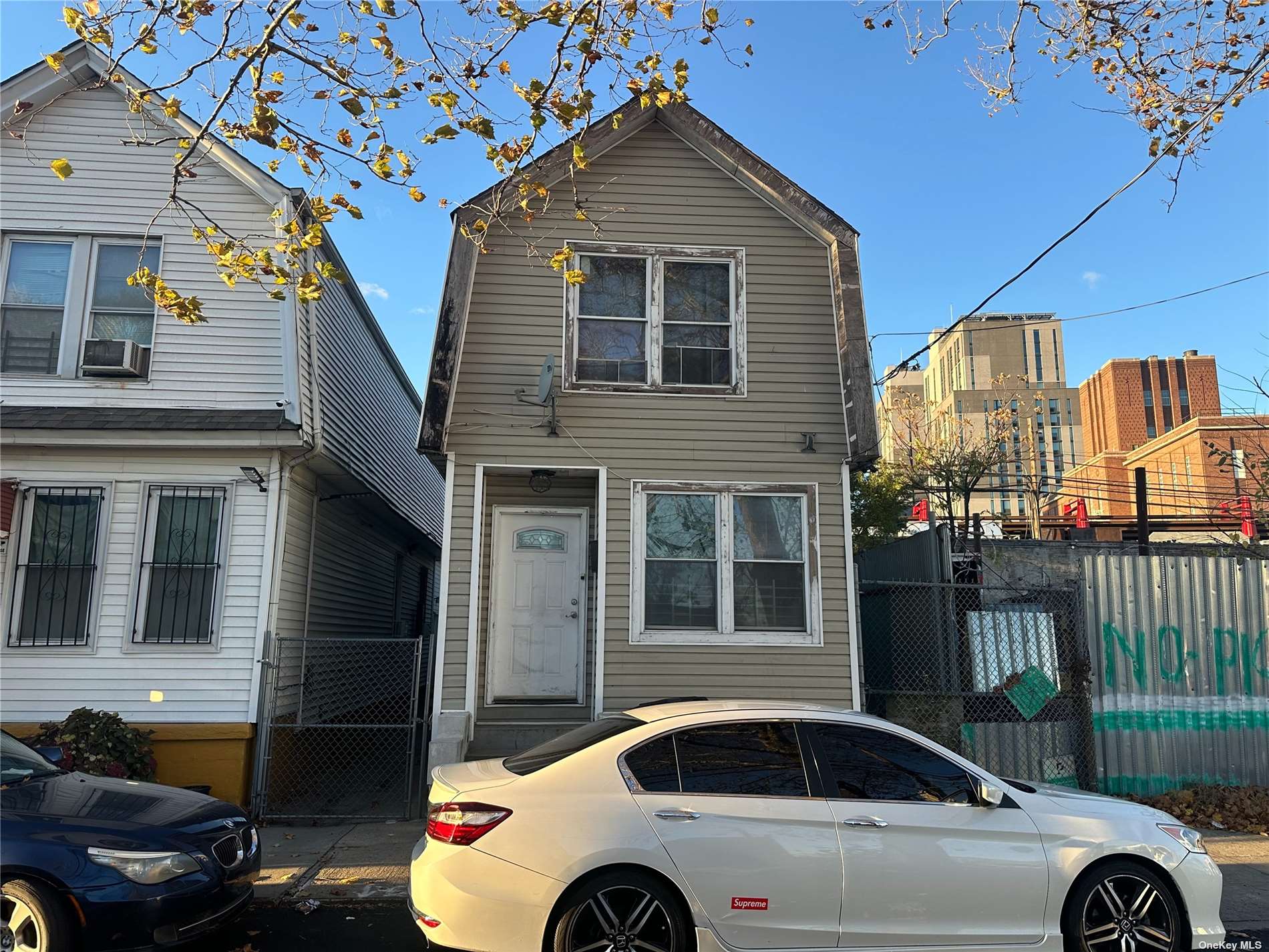 a front view of a house with parking