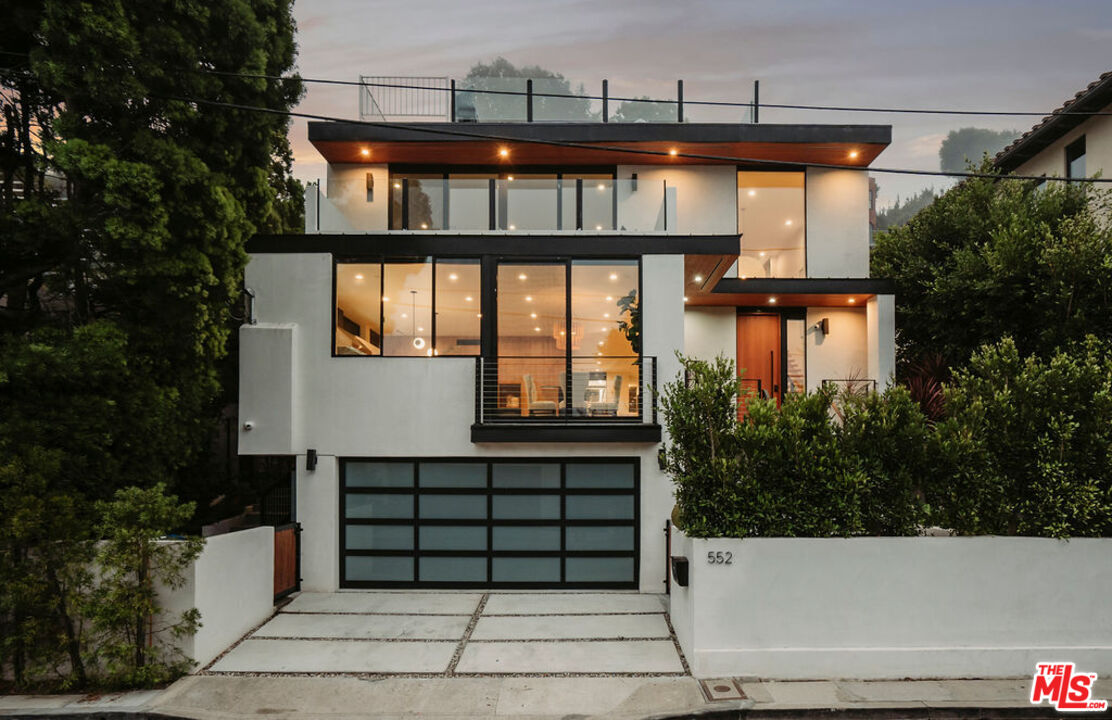 a front view of a house with a balcony