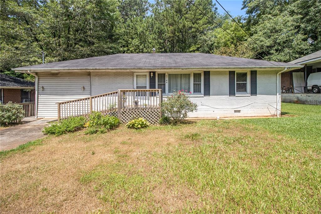 front view of a house with a yard