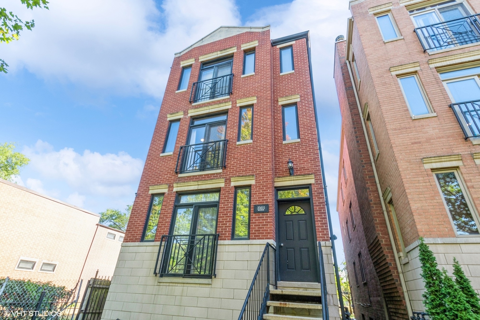 a front view of a multi story residential apartment building