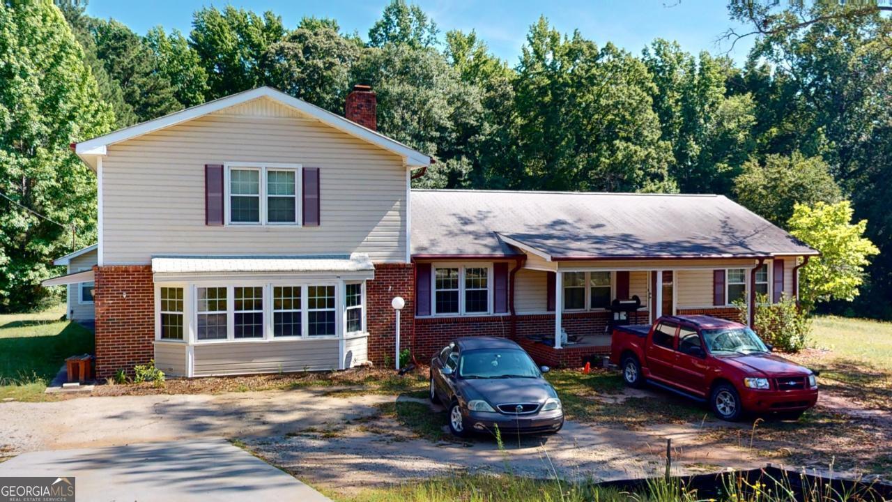 a front view of a house with patio