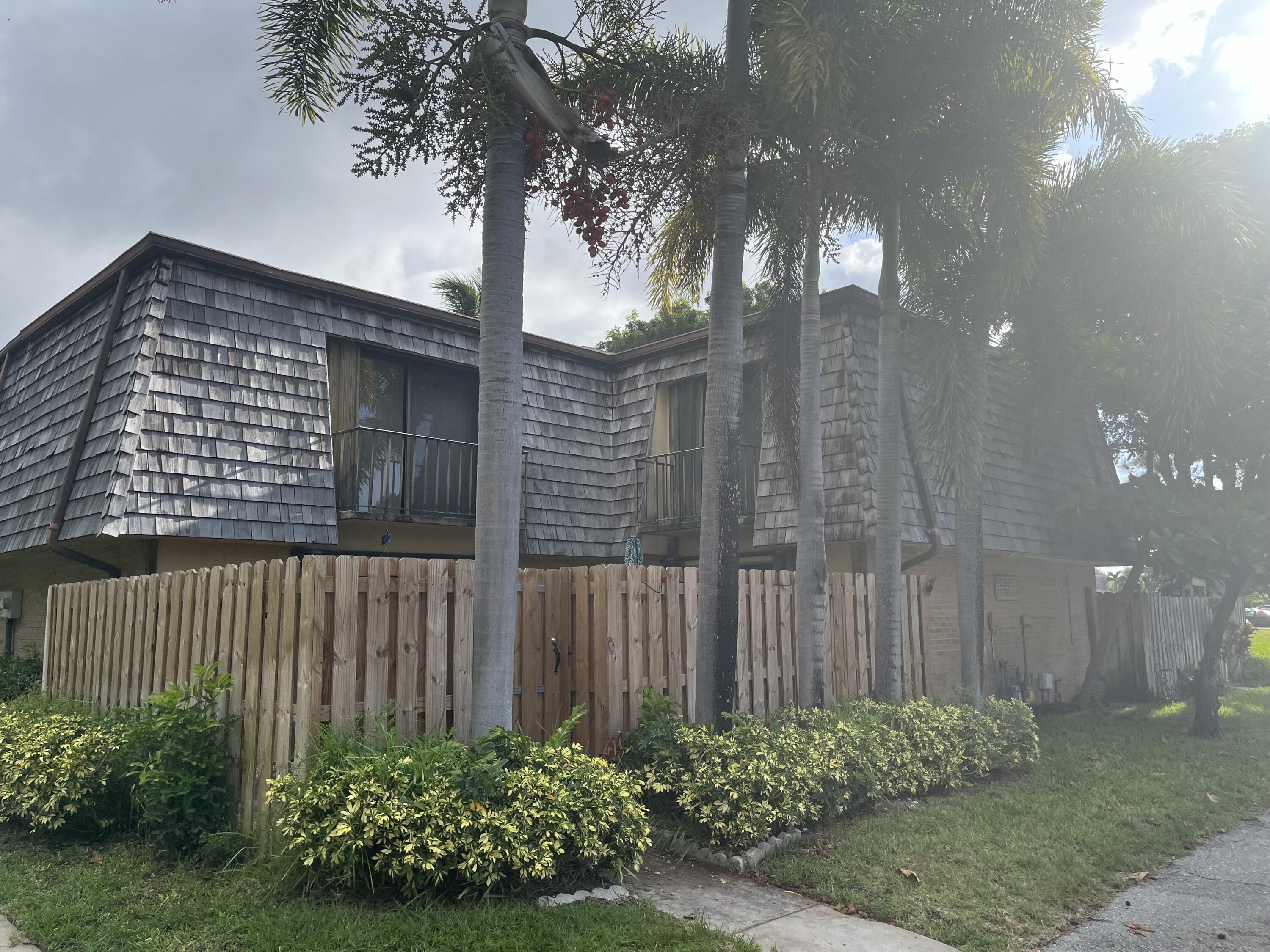 a front view of a house having yard