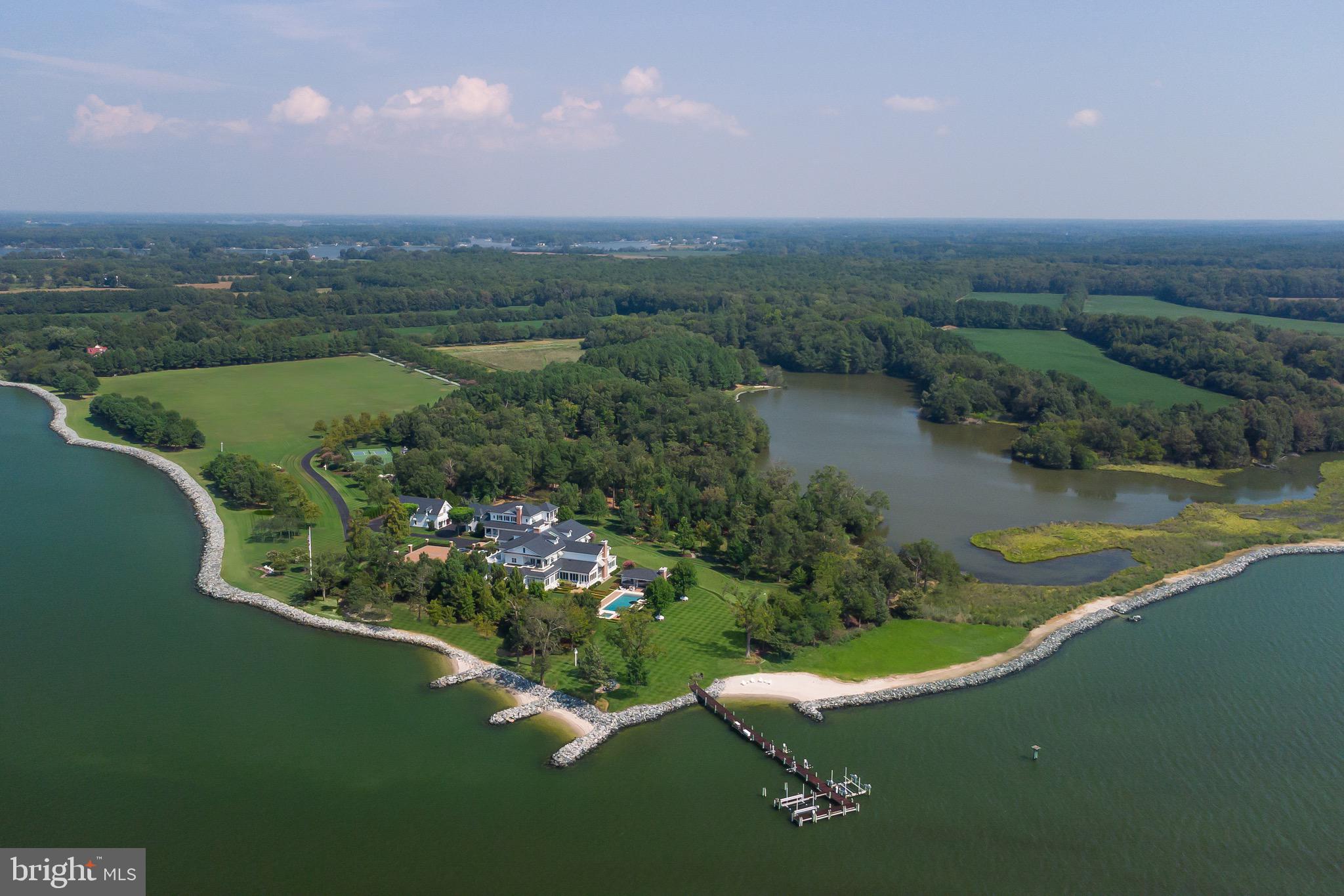 a view of a lake with a yard