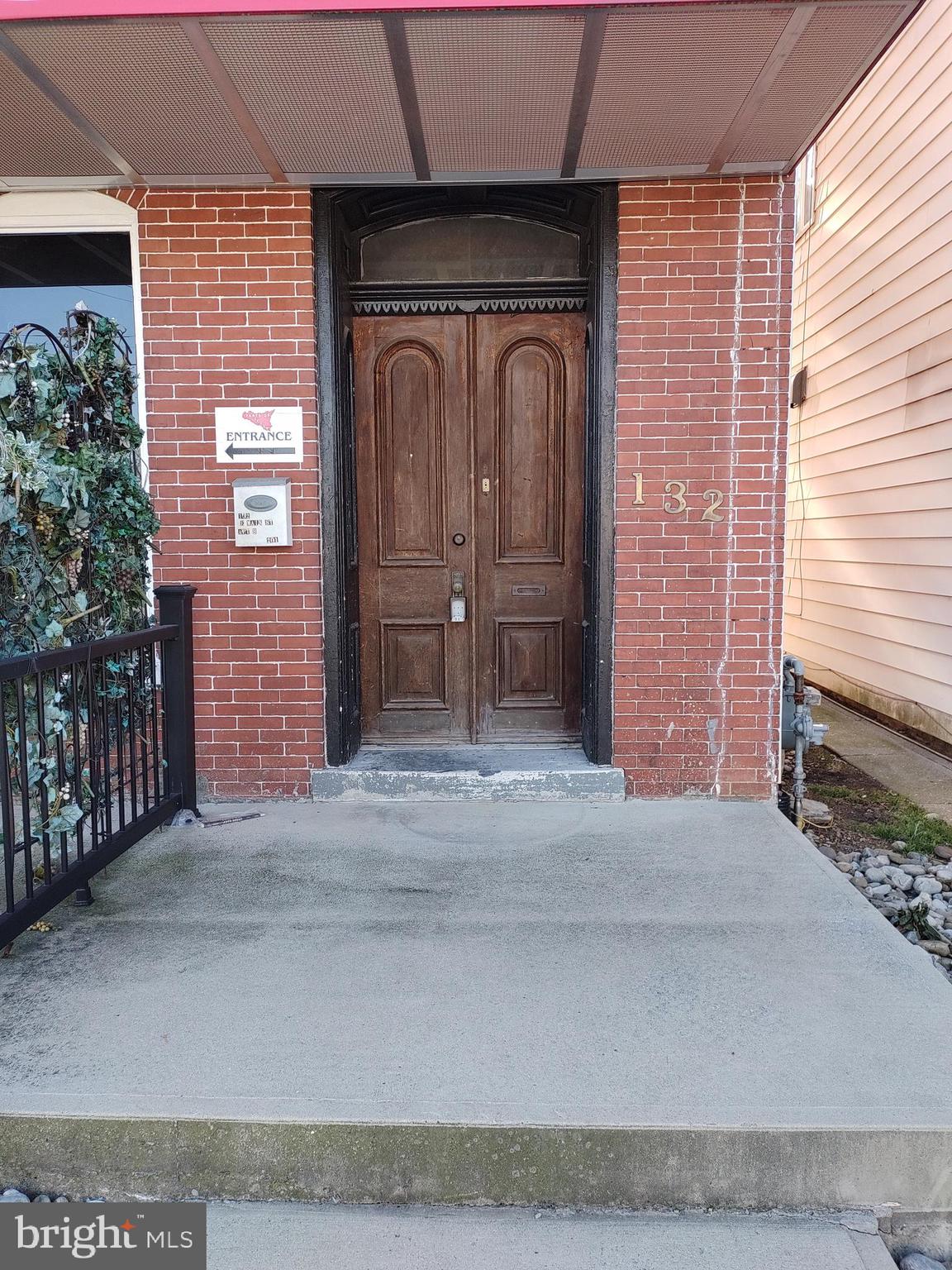 a front view of a house with a garage