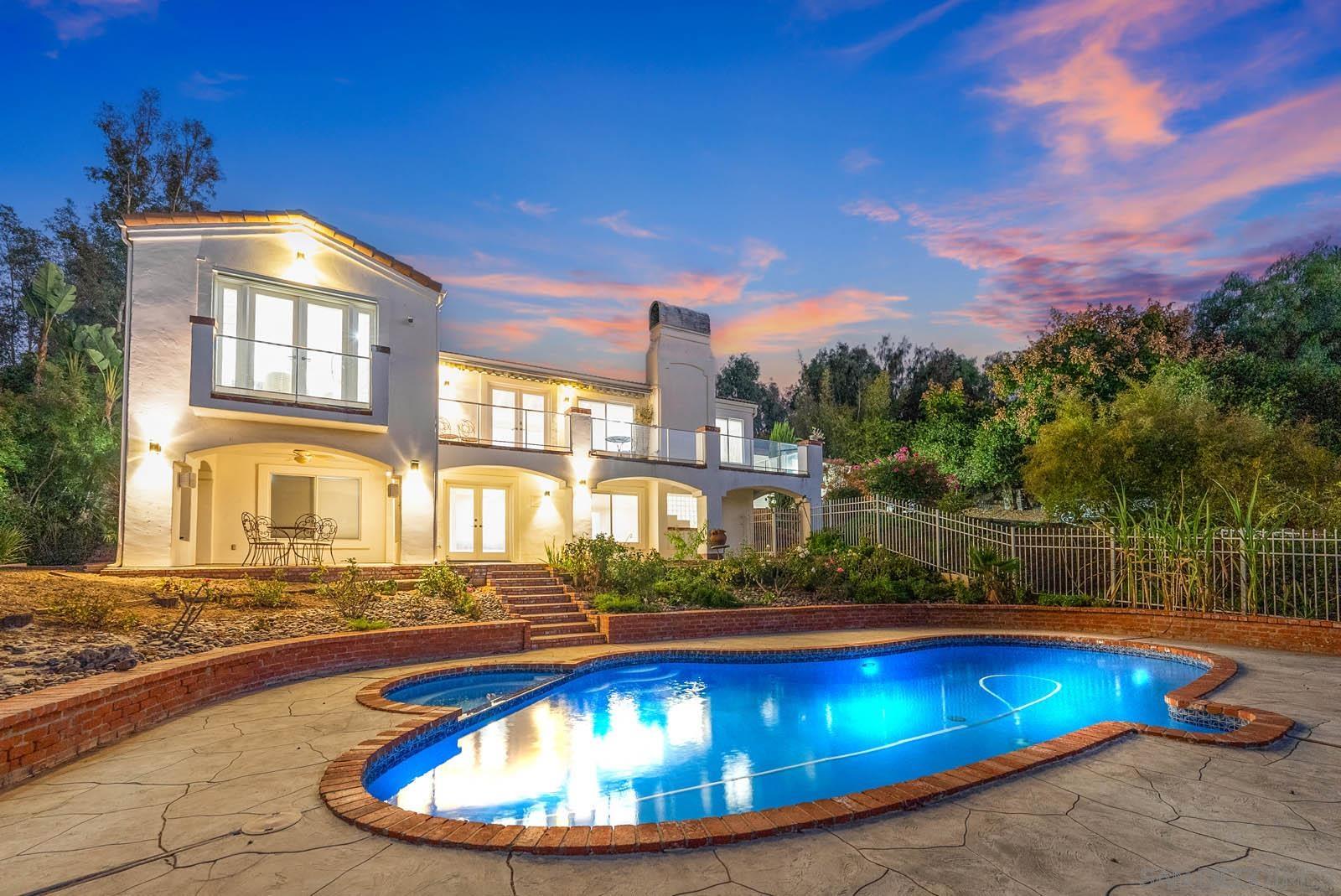 a view of swimming pool with outdoor seating