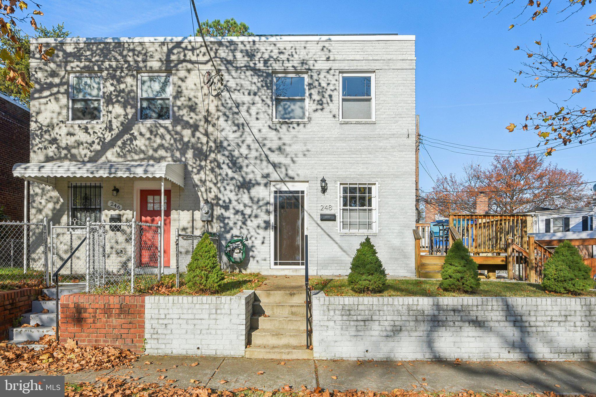 front view of a house with a street