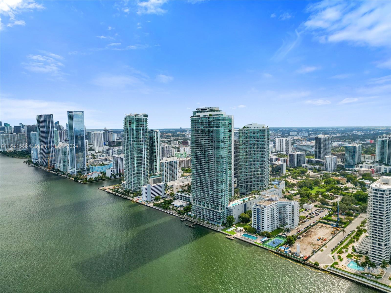 a view of a city with tall buildings