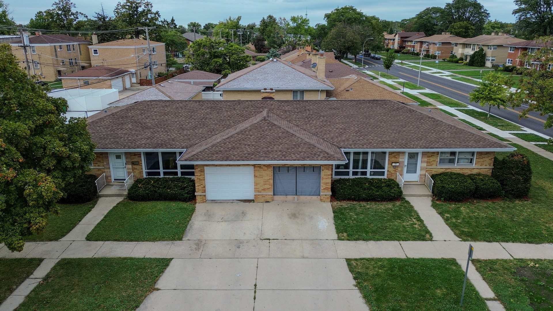 a aerial view of a house with garden