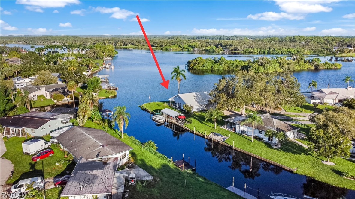 an aerial view of houses with outdoor space