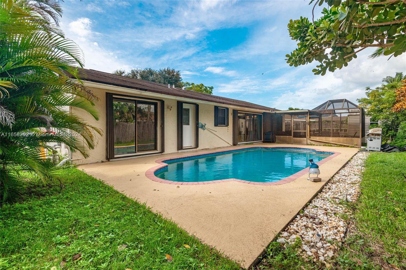 a view of a house with a swimming pool