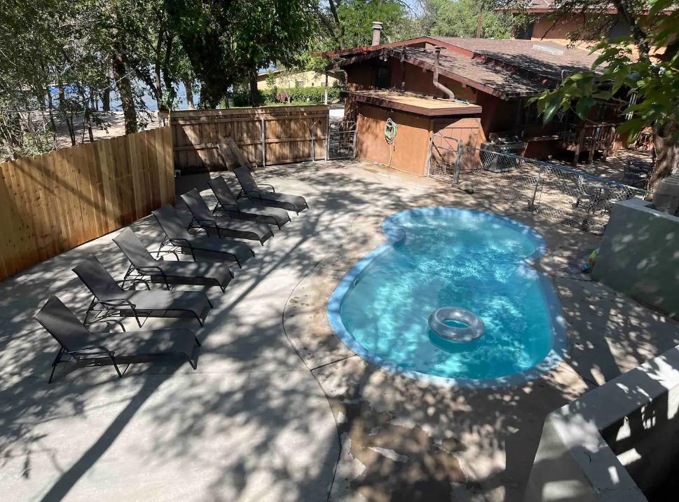 a view of a fire pit with flower plants