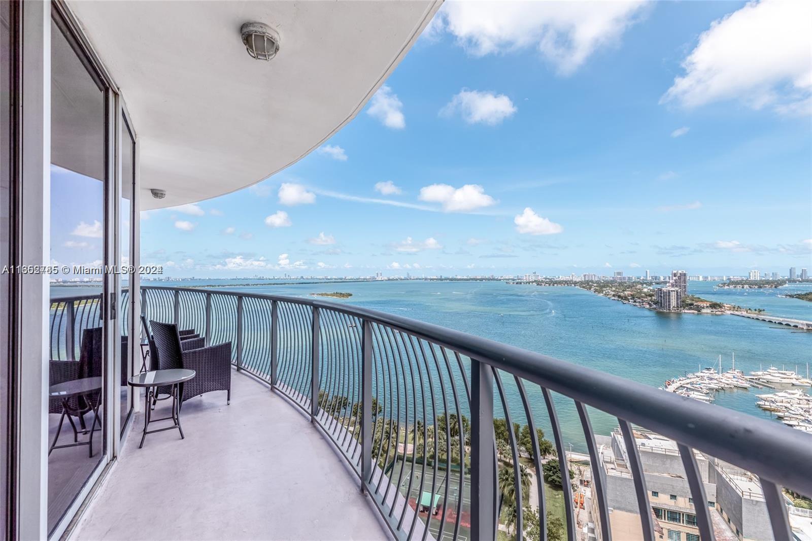 a view of balcony with furniture