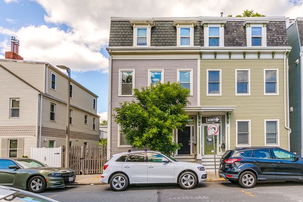 a car parked in front of a building