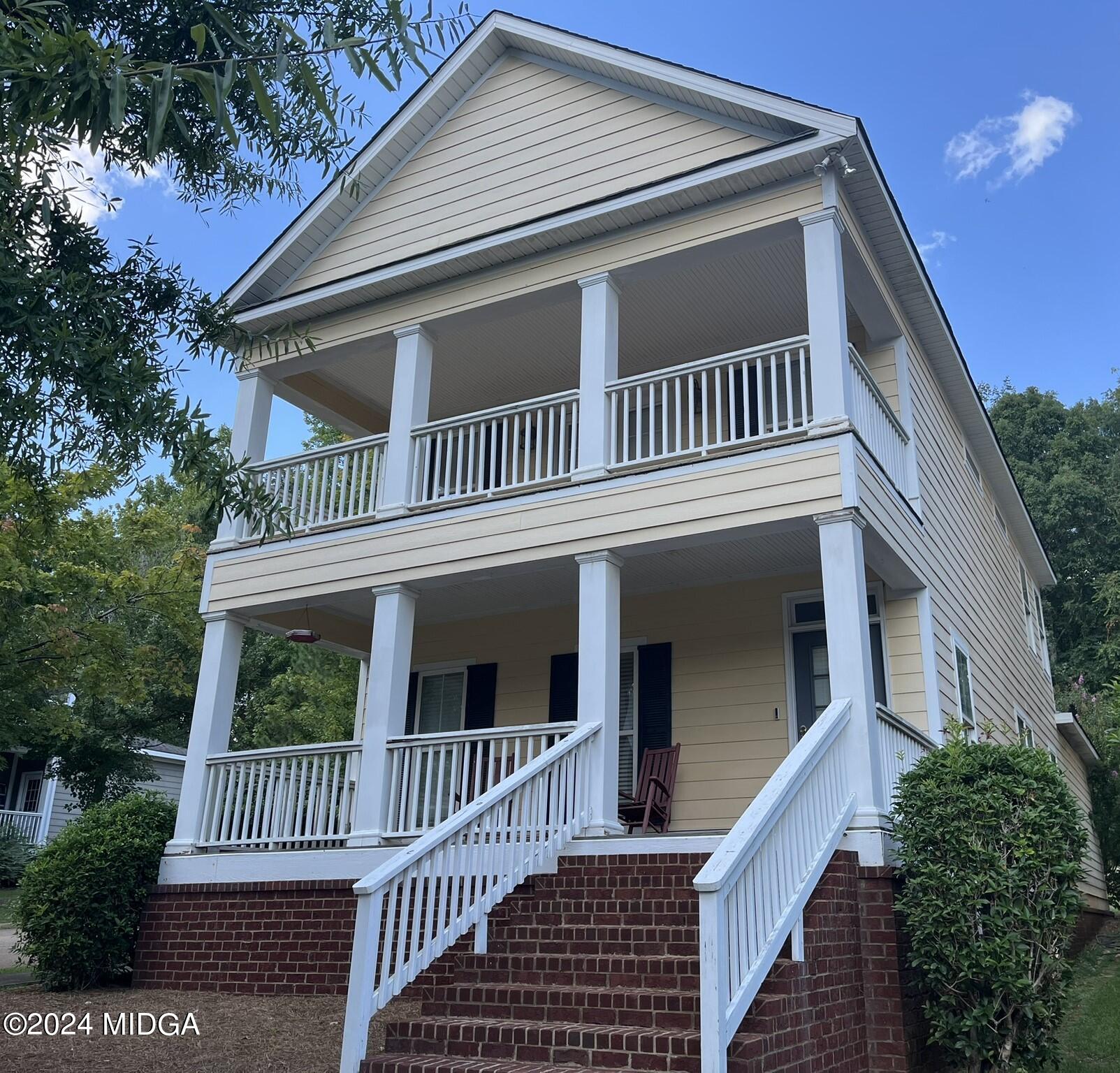 a view of a house with a deck