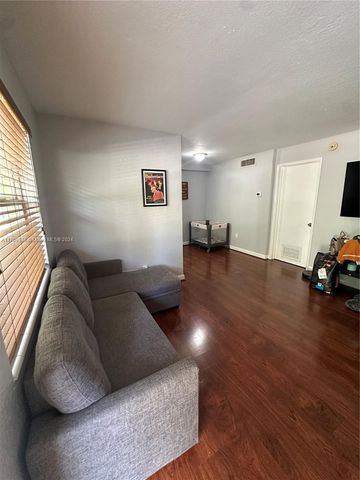 $215,000 | 241 South Royal Poinciana Boulevard, Unit 116 | Miami Springs