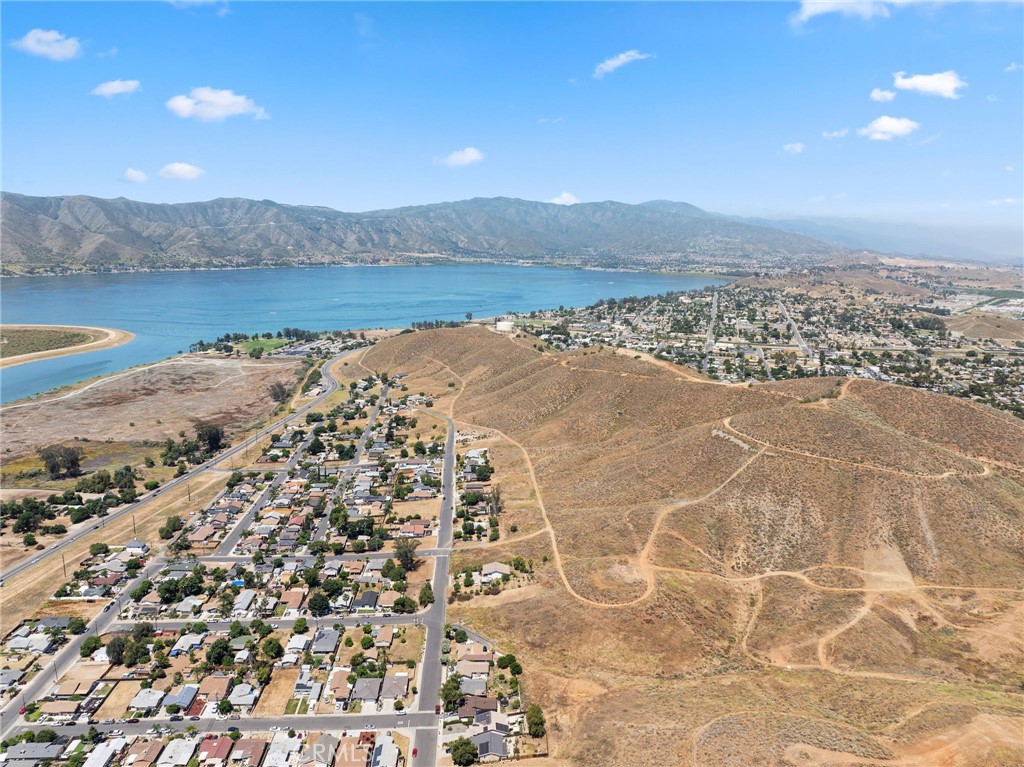 an aerial view of mountain with lake view