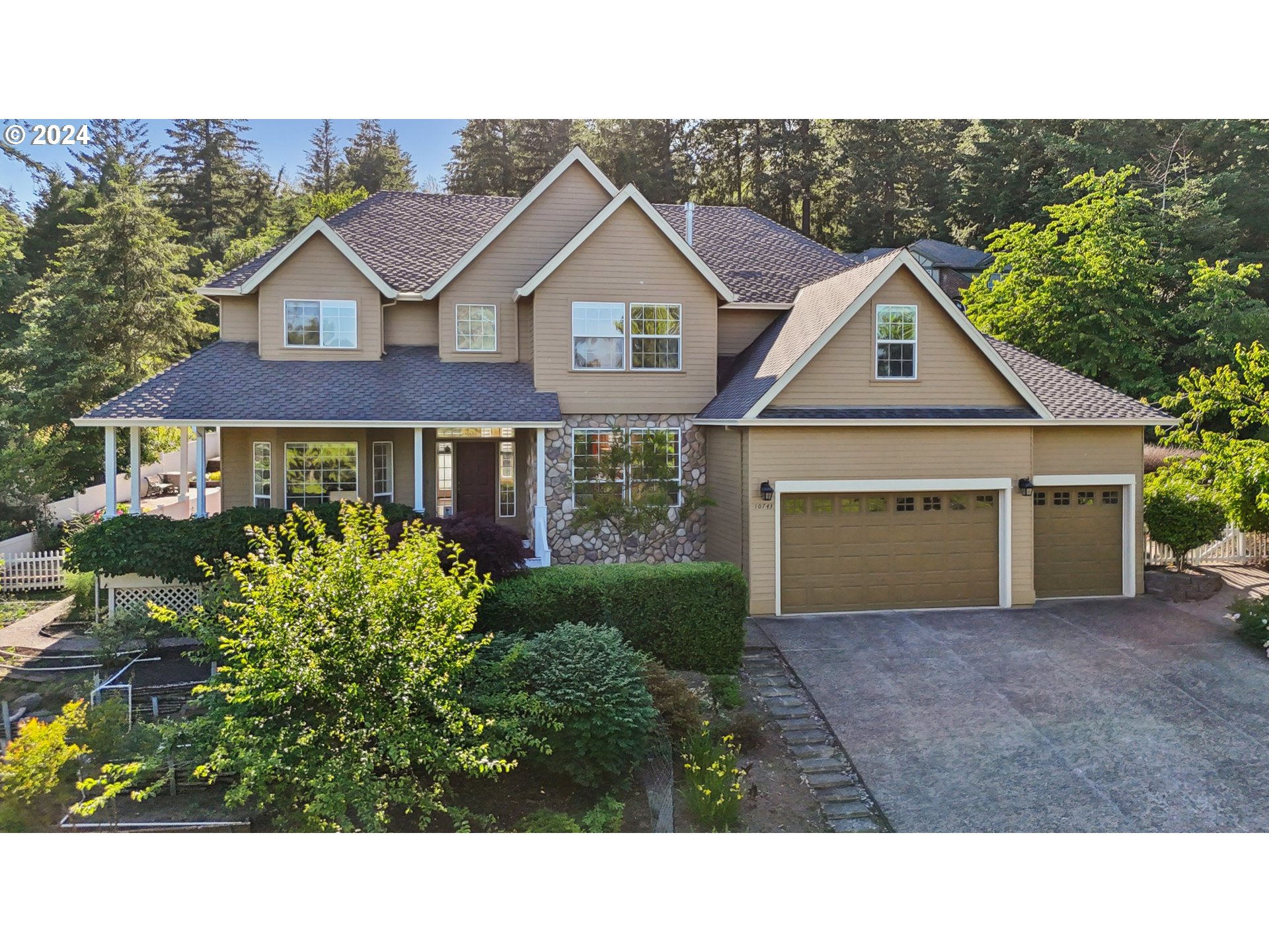 a house view with a garden space