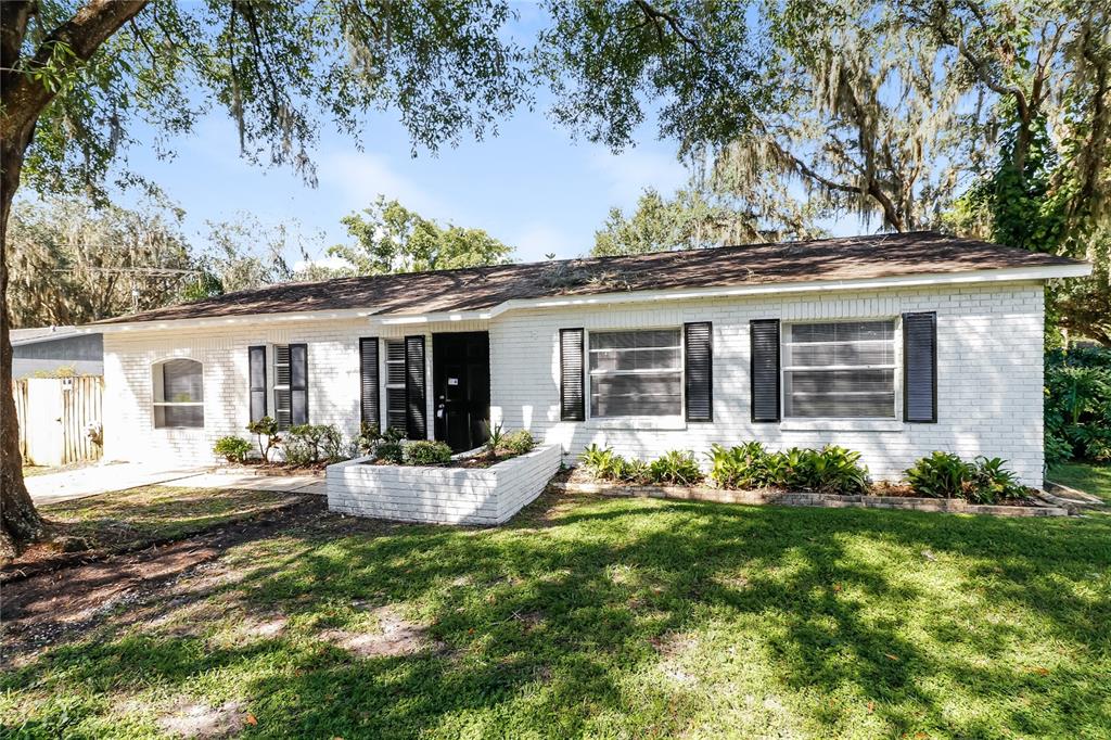 front view of a house with a yard