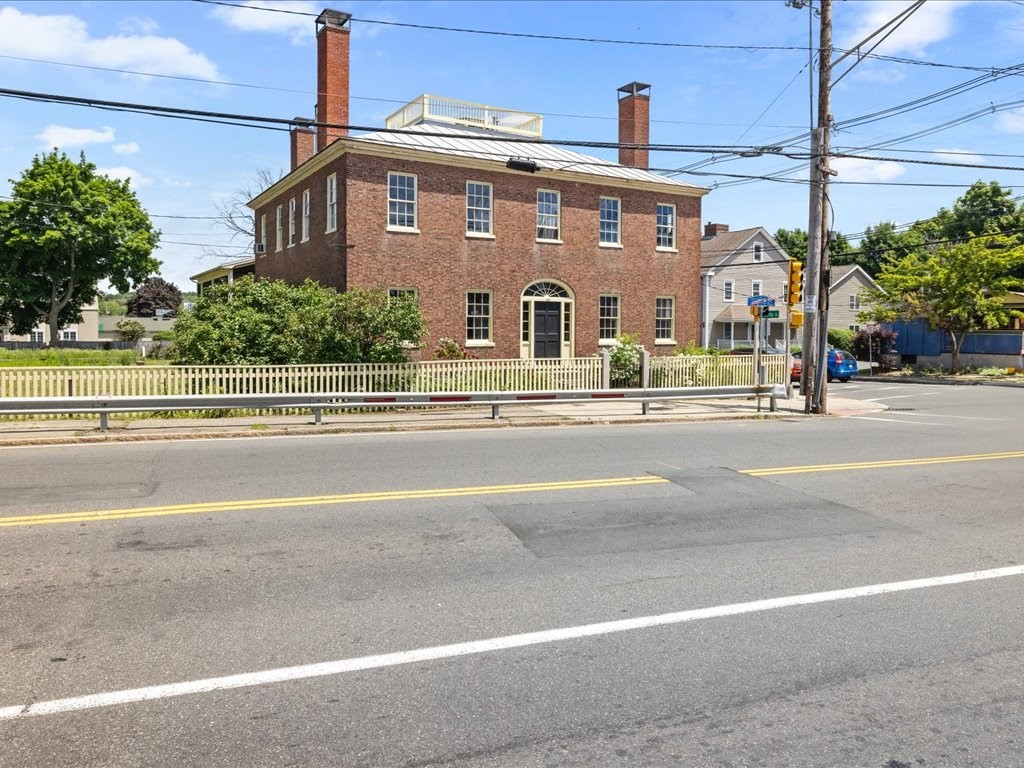 a view of a building with a street