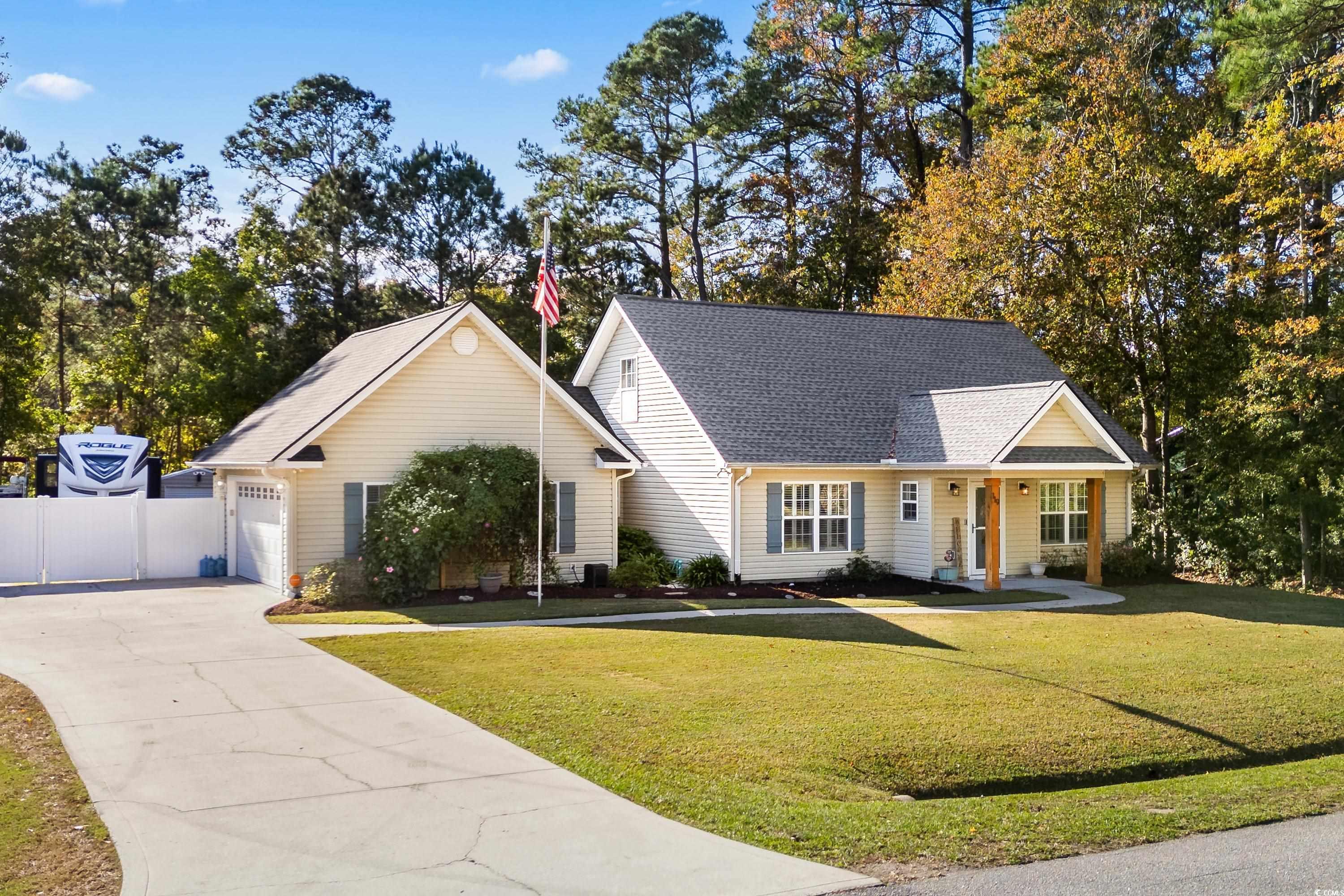 View of front of house with covered porch, a front