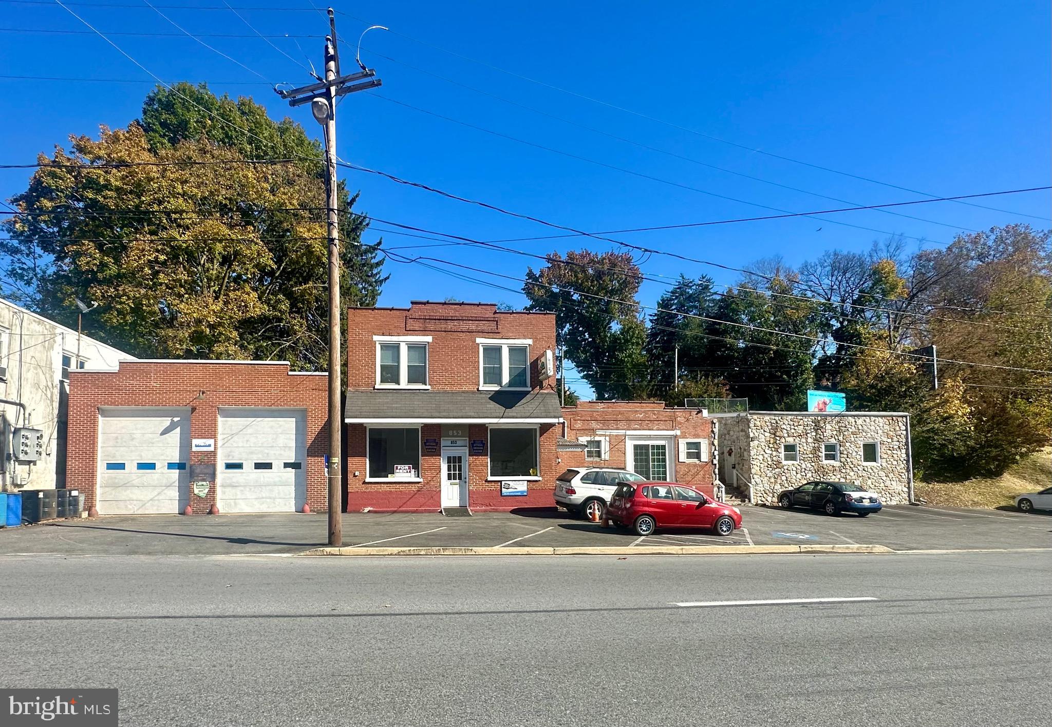 a view of a city street both side of the house