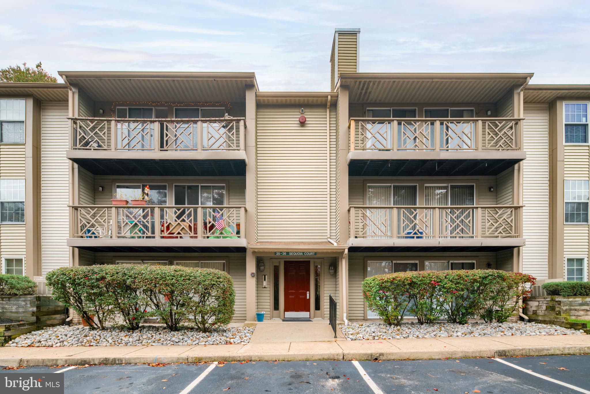 a front view of multi story residential apartment building