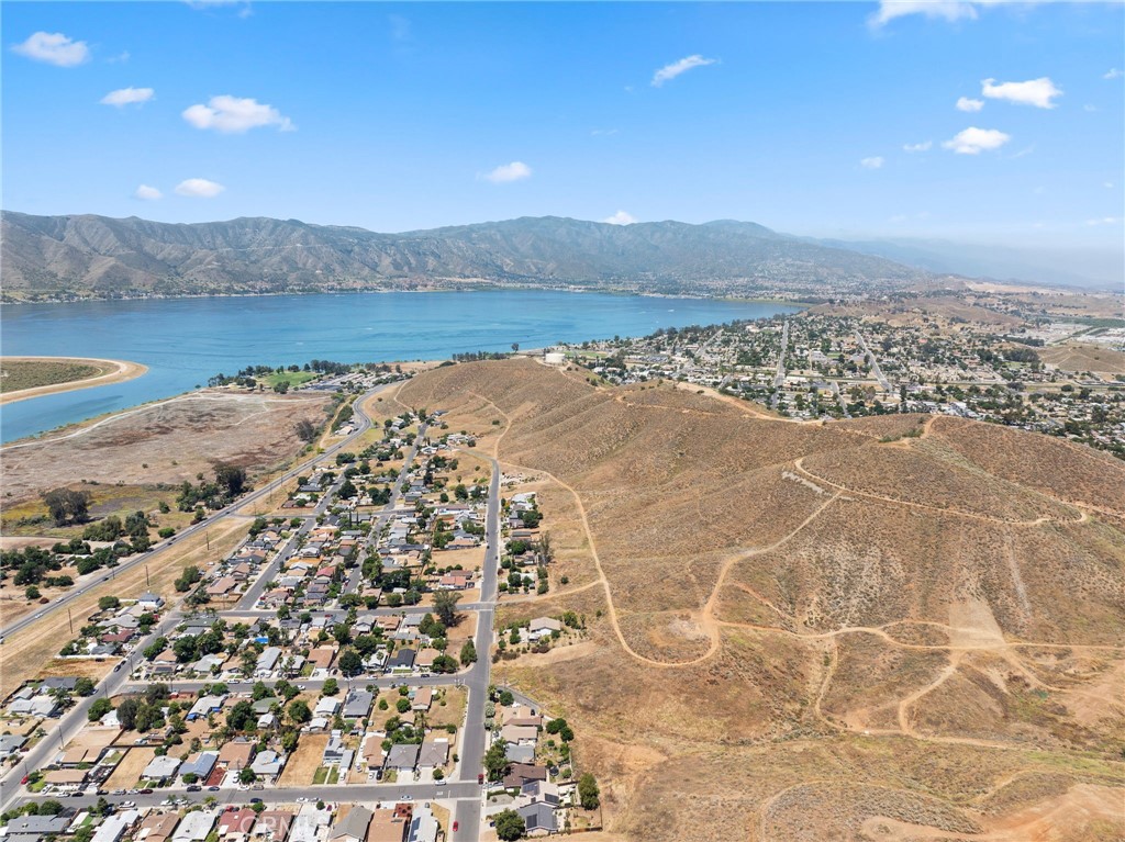 an aerial view of mountain with lake view